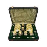 AN EDWARDIAN SILVER AND PORCELAIN COFFEE SET IN TRAVELLING CASE, 1904