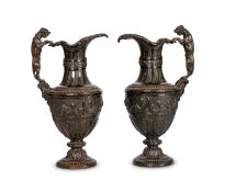 A PAIR OF LATE 18TH CENTURY BRONZE EWERS AFTER THE DESIGN BY NICOLAS DELAUNAY