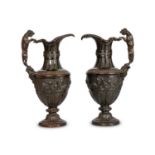A PAIR OF LATE 18TH CENTURY BRONZE EWERS AFTER THE DESIGN BY NICOLAS DELAUNAY