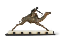 AN EARLY 20TH CENTURY FRENCH ART DECO PERIOD FIGURE OF A CAMEL RIDER