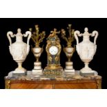 A LARGE PAIR OF 19TH CENTURY ITALIAN ALABASTER URNS AND COVERS IN THE STYLE OF PIRANESI