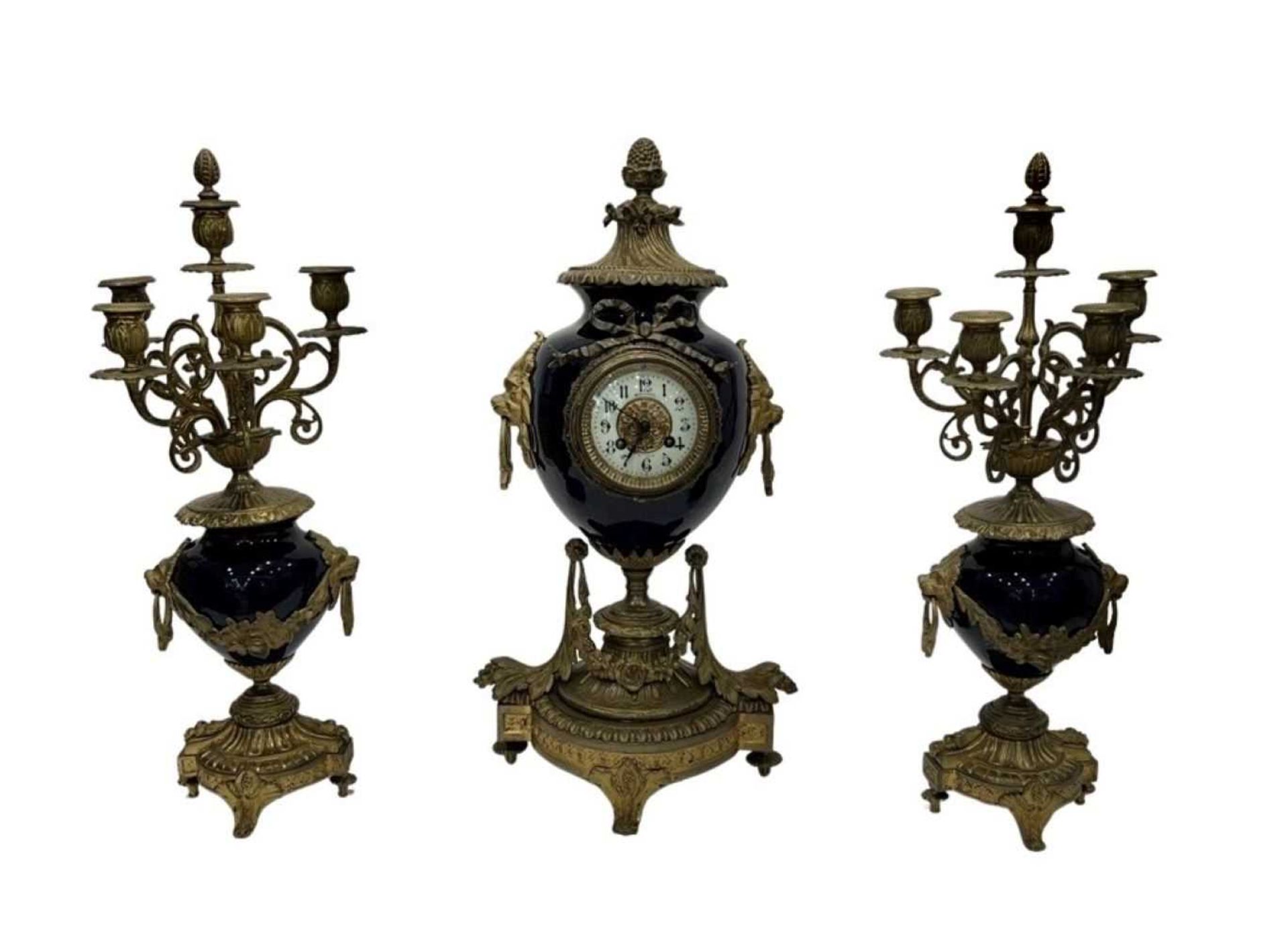 A LATE 19TH CENTURY FRENCH PORCELAIN AND GILT BRONZE MOUNTED CLOCK GARNITURE