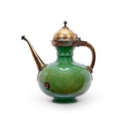 A 17TH CENTURY SAFAVID CERAMIC EWER WITH LATER MOUNTS