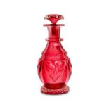 A LATE 19TH CENTURY RUBY CUT GLASS DECANTER ATTRIBUTED TO STEVENS AND WILLIAMS