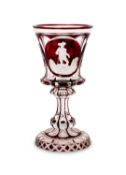 A 19TH CENTURY BOHEMIAN FLASHED RUBY AND ETCHED AND CUT GLASS GOBLET CIRCA 1860