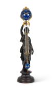 A LARGE LATE 19TH CENTURY BRONZED-SPELTER FIGURAL SWINGING MYSTERY CLOCK
