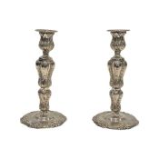 A PAIR OF STERLING SILVER CANDLESTICKS