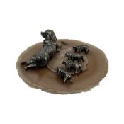 A SILVER MODEL OF A COCKER SPANIEL AND PUPPIES ON AGATE BASE