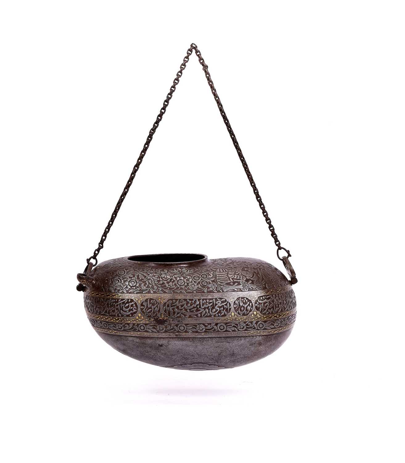 A PERSIAN GOLD DAMSCENED STEEL BEGGING BOWL (KASHKUL) IN THE FORM OF A COCO DE MER