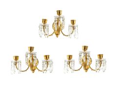 BACCARAT: A SET OF THREE LATE 19TH / EARLY 20TH CENTURY GILT BRONZE AND CRYSTAL WALL LIGHTS