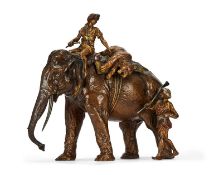 FRANZ BERGMAN (AUSTRIAN 1861 -1936): A LARGE COLD PAINTED BRONZE MODEL OF HUNTERS WITH AN ELEPHANT
