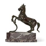 A LATE 19TH CENTURY BRONZE MODEL OF A HORSE, AFTER THE ANTIQUE