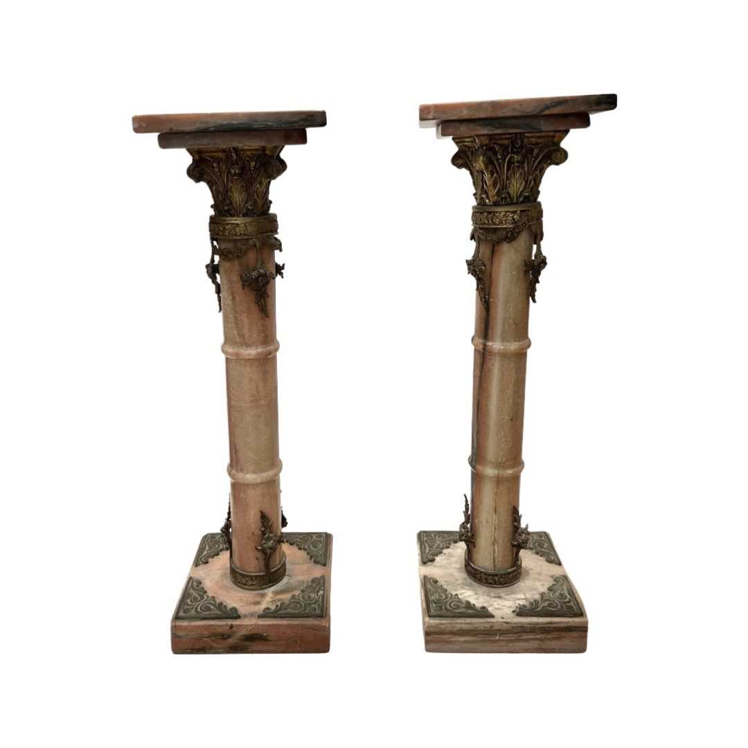 A PAIR OF ART NOUVEAU STYLE PINK MARBLE AND ORMOLU MOUNTED PEDESTALS