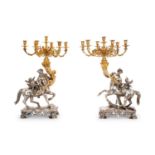 A MASSIVE PAIR OF SILVER AND SILVER GILT ITALIAN BAROQUE STYLE CANDELABRA