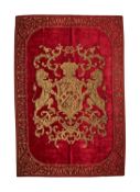 A LARGE BAROQUE STYLE VELVET BANNER DEPICTING A HERALDIC CREST