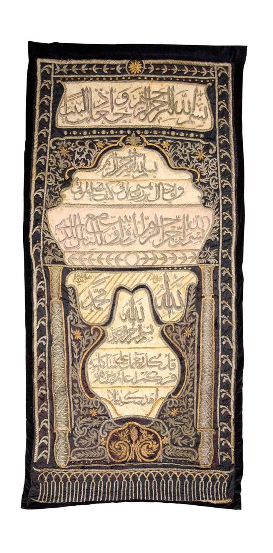 A 19TH CENTURY OTTOMAN SILVER THREAD AND SILK EMBROIDERED QURANIC CURTAIN