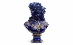 A LATE 19TH CENTURY FRENCH BLUE GLAZED PORCELAIN BUST OF MARIANNE OF FRANCE