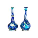 A HARLEQUIN PAIR OF 19TH CENTURY PERSIAN QAJAR BOTTLE VASES