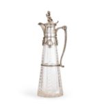 A LATE 19TH CENTURY GERMAN SILVER AND CUT CRYSTAL GLASS WINE DECANTER