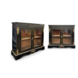 A PAIR OF 19TH CENTURY NAPOLEON III PERIOD EBONISED, ORMOLU AND BRASS INLAID BOOKCASES