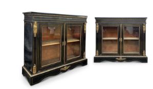 A PAIR OF 19TH CENTURY NAPOLEON III PERIOD EBONISED, ORMOLU AND BRASS INLAID BOOKCASES