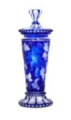 A BOHEMIAN BLUE OVERLAY AND INTAGLIO CARVED GLASS VASE AND COVER ATTRIBUTED TO FRANZ PAUL ZACH