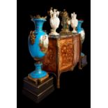 A MONUMENTAL PAIR OF SEVRES STYLE PORCELAIN AND ORMOLU MOUNTED VASES
