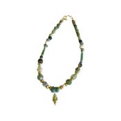 A ROMAN GLASS AND GOLD NECKLACE