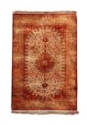 A PERSIAN GHOM SILK RUG