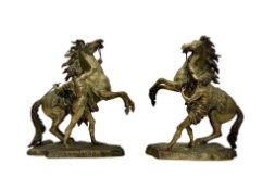 A PAIR OF 19TH CENTURY BRONZE MODELS OF THE MARLEY HORSES AFTER COUSTOU (FRENCH, 1677-1746)