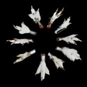 A COLLECTION OF TEN EARLY 20TH CENTURY TAXIDERMY SCOTTISH GROUSE FEE BROOCHES
