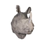 A PAINTED CAST OF A JAVAN RHINOCEROS HEAD BY SIMON 'THE STUFFA' WILSON