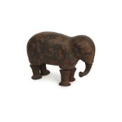 A 19TH CENTURY AMERICAN CAST IRON WALKING ELEPHANT TOY DATED 1873