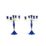 A PAIR OF LAPIS LAZULI AND BRASS FIVE LIGHT CANDELABRA