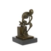 A BRONZE MEMENTO MORI OF A HUMAN SKELETON 'THE THINKER'