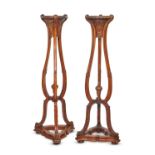 A PAIR OF LATE 19TH / EARLY 20TH CENTURY MAHOGANY TORCHERE STANDS