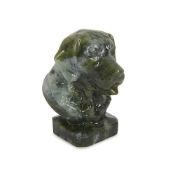 A MINIATURE CARVED SOUTHERN JADE BUST OF A DOG