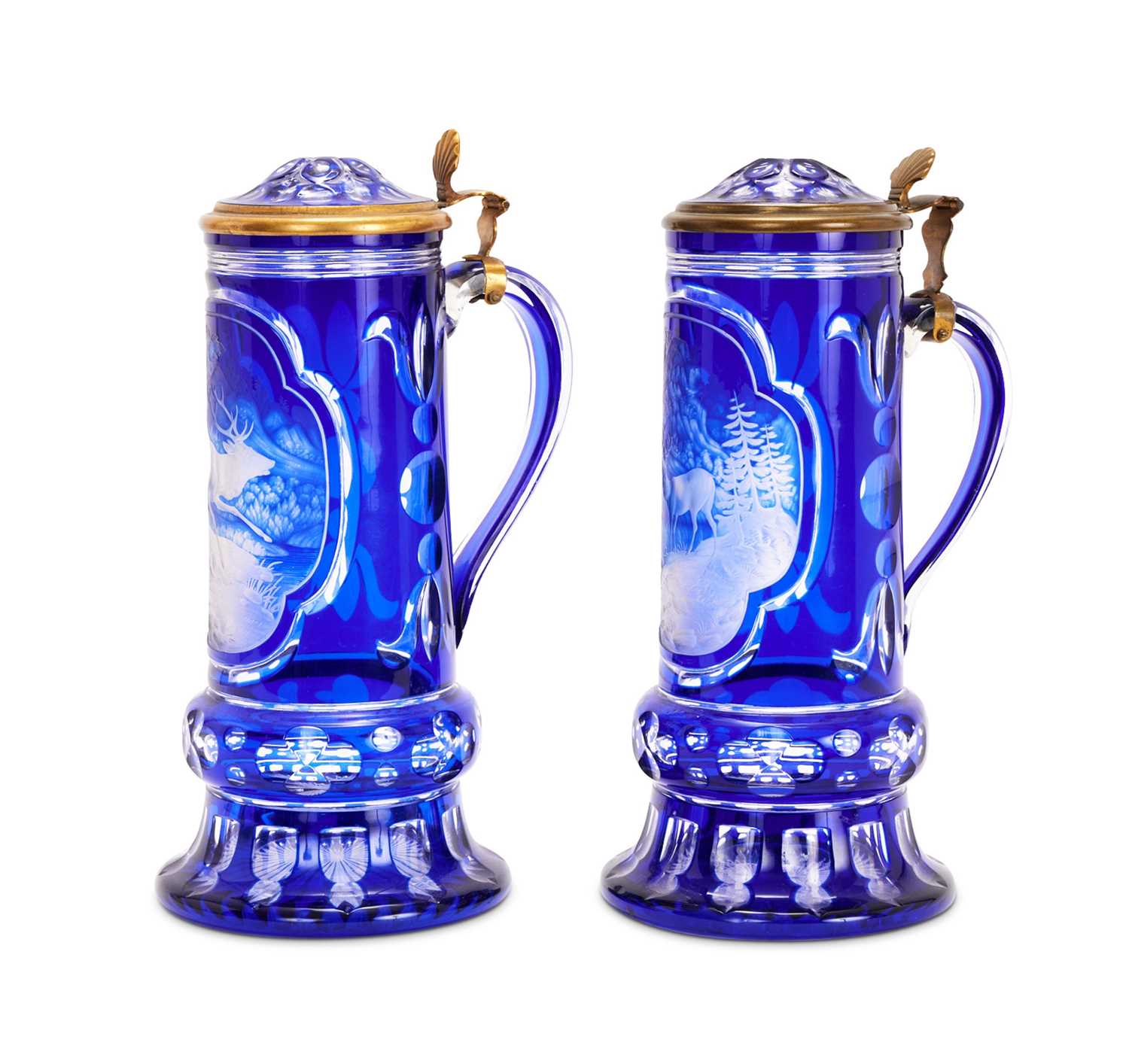A FINE PAIR OF 19TH CENTURY BOHEMIAN BLUE OVERLAY CUT AND ENGRAVED GLASS TANKARDS - Image 3 of 4