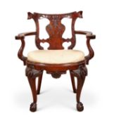 A 19TH CENTURY IRISH MAHOGANY OPEN ARMCHAIR