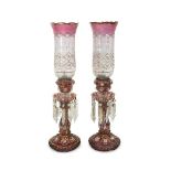 A PAIR OF BACCARAT STYLE EARLY 20TH CENTURY RUBY GLASS LUSTRES
