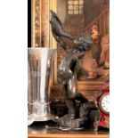 A LATE 19TH / EARLY 20TH CENTURY BRONZE FIGURE OF A PUTTO DRINKING FROM A SHELL