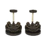 A PAIR OF MID 20TH CENTURY BRONZE AND CAMEL BONE MONKEY CANDLESTICKS