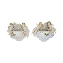 A PAIR OF DRESDEN PORCELAIN CHERUB WALL SCONCES