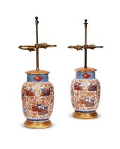 A PAIR OF JAPANESE MEIJI PERIOD IMARI PORCELAIN VASES CONVERTED TO LAMPS