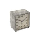 A 1930'S SILVER MINIATURE TRAVELLING ALARM CLOCK IN ORIGINAL CASE