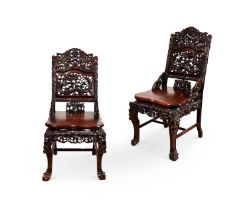 A PAIR OF CHINESE QING DYNASTY CARVED HONGMU CHAIRS