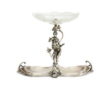 AN ART NOUVEAU PERIOD SILVER PLATED AND CUT GLASS CENTREPIECE BY WMF