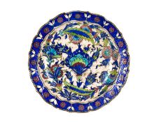 AN IZNIK STYLE POTTERY DISH, TURKEY