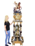 A MONUMENTAL PORCELAIN AND ORMOLU FLOORSTANDING CLOCK