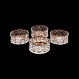 A FINE SET OF FOUR STERLING SILVER WINE COASTERS BY HENRY WILKINSON & CO, 1844